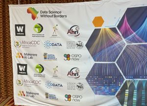 A large poster that says 'Data Science Without Borders' and includes logos of participating organisations including OSPO Now